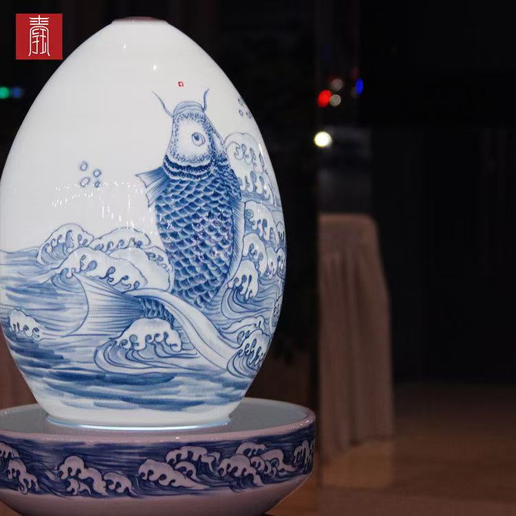 景德钰青·财源滚滚流水瓶【青花鱼化龙】